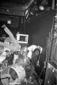 Kurt Cobain falling into the drums, with Nirvana at Man Ray, Cambridge cir. 1989